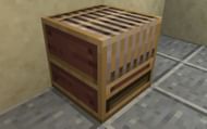 A loom block in Minecraft can be crafted with two strings and wooden planks (Image via Mojang)